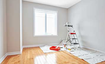 養生カーペットの上に乗せた脚立